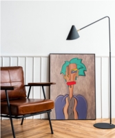 Figure with green hair